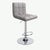 Swivel Bar Stool Adjustable Height Chair in gray with tufted upholstery and chrome base.