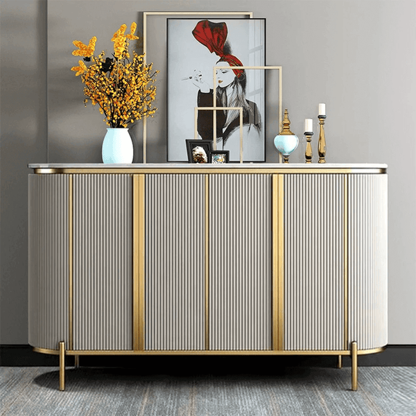 Modern Luxury Sideboard Table with fluted doors, gold accents, and decorative items on top.
