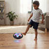 Child playing with LED Hover Soccer Ball, featuring colorful lights, in a bright indoor living space.