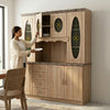Minimalist Glass Kitchen Cabinet Shutter Door in modern kitchen setting with woman placing dish inside cabinet.