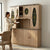 Minimalist Glass Kitchen Cabinet Shutter Door in modern kitchen setting with woman placing dish inside cabinet.