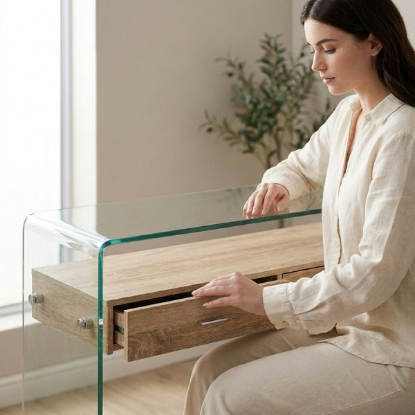 A woman interacting with a Tempered Glass Console Table, highlighting its modern design and functionality.