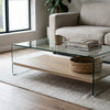 Tempered Glass Coffee Table with Oak Shelf featuring a sleek design and practical storage in a modern living room setting.