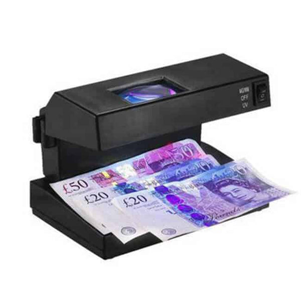 Counterfeit Money Detector with UV Lamp displaying British banknotes under UV light.