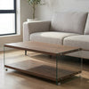 Rectangle Wooden Top Coffee Table with glass sides in a cozy living room setting.