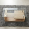 Tempered Glass Top Coffee Table with Oak Base on a gray rug, showcasing its modern design and sturdy structure.
