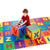 Child playing on the colorful Alphabet Play Mat with foam blocks, engaging in educational fun.