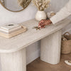 Modern Fluted Pedestal Console Table with keys and decor in a stylish entryway setup