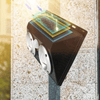 Motion Sensor Wall Light mounted on a wall, illustrating solar charging and illumination features.