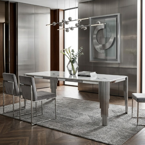 Mirren Luxury Marble Dining Table showcased in a modern dining area with sleek metallic legs and a polished marble surface.