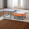 Elegant Coffee Table Set featuring modern nesting design and vibrant orange drawer.