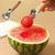 Stainless Steel Fruit & Dessert Scoop carving watermelon into perfect balls