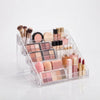 5-Tier Crystal-Style Beauty Organizer displayed with various cosmetics and brushes neatly arranged.