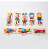 Wood Wonder 3D Animal & Traffic Puzzle Set colorful wooden pieces including dinosaur, monkey, rabbit, girl, boy, fish, airplane, and bus.