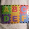 Colorful Alphabet Play Mat foam tiles featuring letters A to F in bright colors, ideal for children's learning and play.