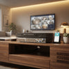 5MP 5-in-1 32-Channel Hybrid Digital Video Recorder on a wooden TV stand with modern decor.