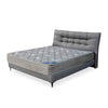 Elegant Upholstered Sleigh Bed with padded headboard and modern design, ideal for stylish bedroom setups.