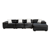 Modern Modular Sectional Sofa with black leather upholstery and soft pillows for comfortable seating.