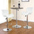 Round Bistro Bar Table with Adjustable Height and stylish white bar stools in a modern living space.