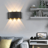 Modern LED Wall Light illuminating a stylish living room with sleek design and warm glow.