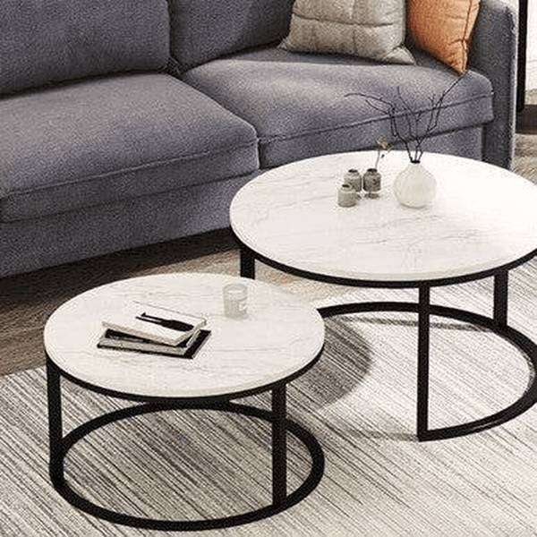 Space-Saving Coffee Table Set – Compact Nesting Tables in modern living room setting with gray sofa.