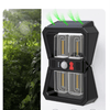 Solar Motion Wall Light mounted on a wall, featuring motion sensors and solar panels for outdoor lighting.