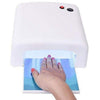 User placing a hand inside a 36W UV Nail Curing Lamp for quick nail polish curing.