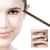 Soft Coloured Cosmetic Art Eyebrow Pencil being applied to enhance eyebrow shape and definition.