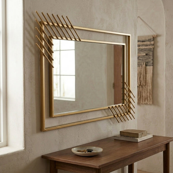 Modern Geometric Decorative Wall Mirror with a striking gold frame and unique multi-paneled design.