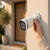 5MP Full-Color Bullet Security Camera mounted on a wall, capturing outdoor surveillance with high-definition clarity.