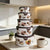 Classic Polished Enamel Ice Flower Bowl 5 Piece Set stacked in a kitchen, showcasing nested colorful bowls.
