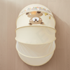 Baby Nest Lounger Travel Crib with Mosquito Net featuring a cute bear design and breathable mesh protection.