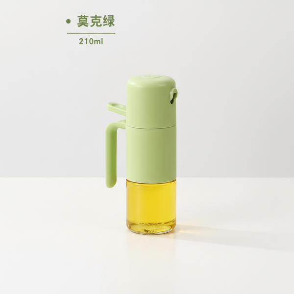 Clear Glass Spray Atomization Oil Bottle in green color, 210ml capacity for precise oil spraying in the kitchen.
