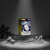 LED Christmas Projector Light box on display with festive imagery and decorations in a dark setting.
