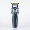 Rechargeable Hair Clipper Grooming Kit featuring a sleek gray design and stainless steel blades for easy grooming.