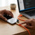 Transparent Fast Charging Data USB Cable connected to smartphone for quick charging.