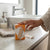 Breathable Waterproof Adhesive Bandage in a bathroom setting, showcasing wound care solution for minor injuries.