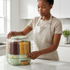 Woman using the 6-Grid Rotating Rice and Grain Dispenser to store various dry foods on a kitchen countertop.
