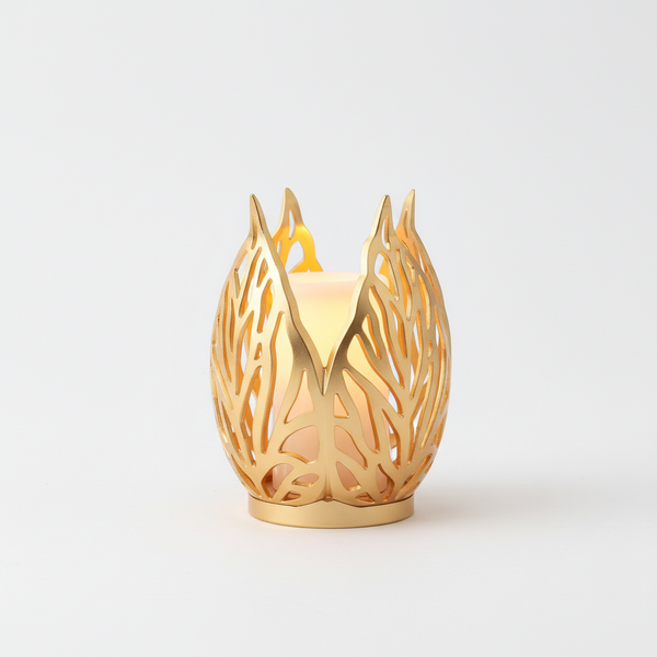 Gold Leaf Tealight Candle Holder featuring an elegant openwork leaf design and warm glow.
