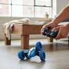 Person controlling a 2.4GHz Double-Sided 360 Stunt Remote Control Car with a game controller in a modern living room.