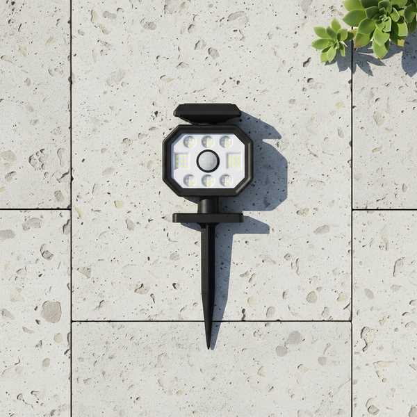 Multifunctional Solar Wall Lamp on a stone surface, showcasing its stylish design and bright LED lights for outdoor illumination.