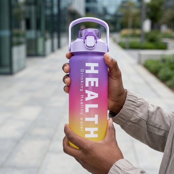 4-in-1 Motivational Gradient Water Bottle Set in hand, promoting healthy hydration with vibrant gradient design.