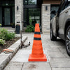 Collapsible Reflective Traffic Safety Cone placed near a vehicle on a driveway, perfect for safety marking.