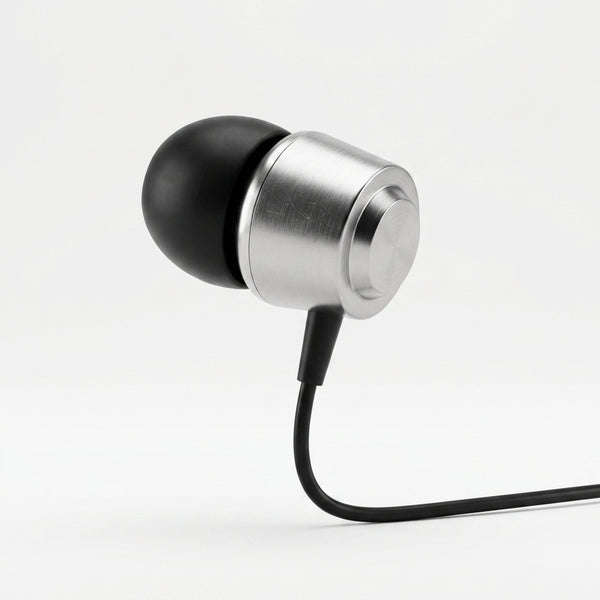 Wired In-Ear Headphones with 3.5mm Jack featuring a sleek metallic design and comfortable ear tips.