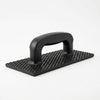 Abrasive Sanding Float for Insulation Levelling with a textured surface and ergonomic handle.