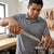 Person using Bent Nose Pliers for precise work in a workshop, demonstrating effective gripping and control.
