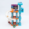 Childrens Modular City Parking Building Playset with ramps and multi-level design for vehicle play.