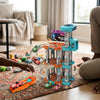 Childrens Modular City Parking Building Playset with toy cars and children playing on a carpet.