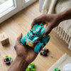 Colorful Plastic Four Wheel Drive Double-Sided Stunt Car held in hands, showcasing its vibrant design and durability.