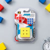 Stress Reliever Fidget 3D Puzzle Cube packaging with colorful geometric shapes and timer on a table